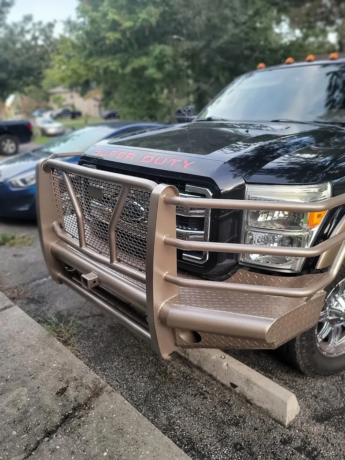 Super Duty with a front guard at Myhree Motors