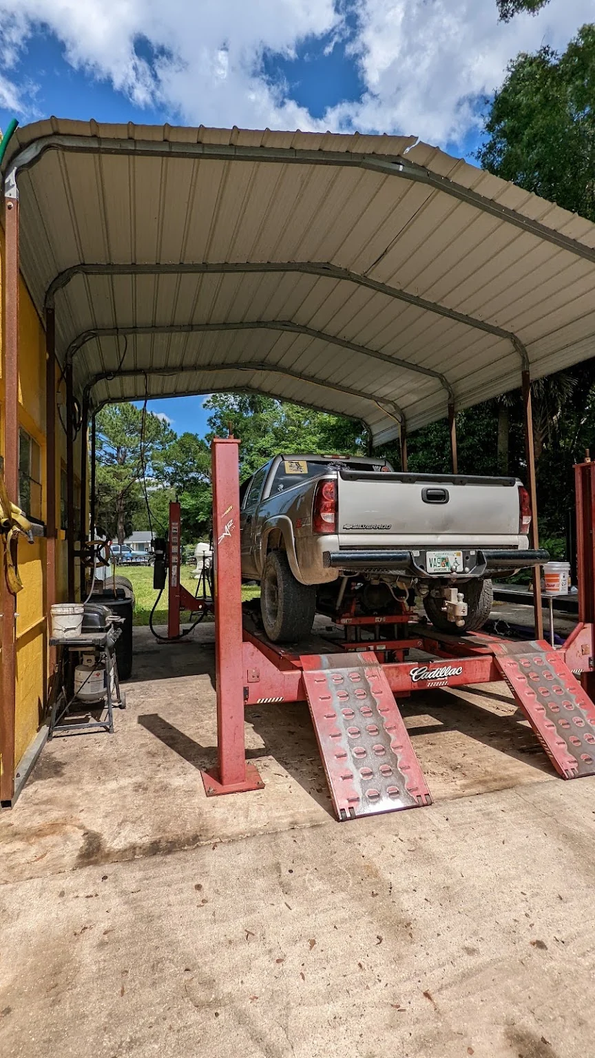 A vehicle up on the lift